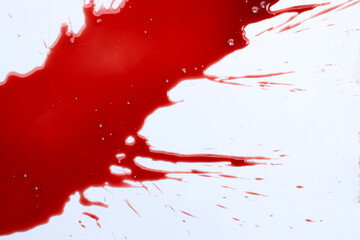 Drops of blood on white background.