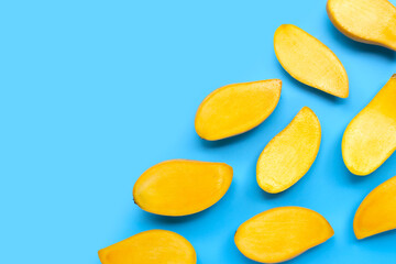 Tropical fruit, Mango on blue background.