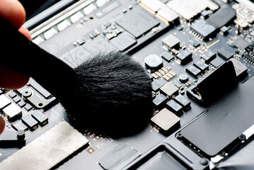 close up of Technician repairing electronic circuit board, repairing, upgrade and technology.