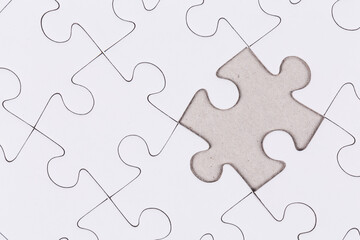Fototapeta premium white puzzle jigsaw close up
