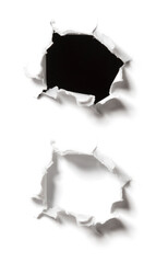 Aufgerissenes Loch in Papier auf Schwarz und Weiß Hintergrund