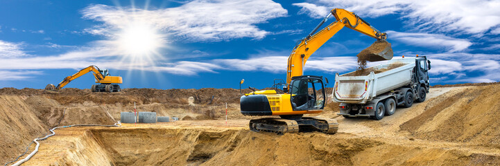 excavator is working and digging at construction site