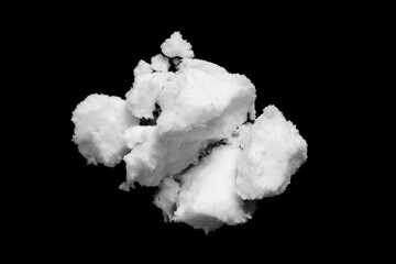 White snow isolated on black background close up