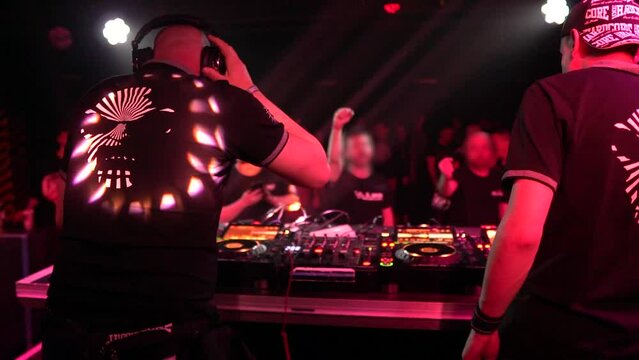 Underground hardcore DJ in action