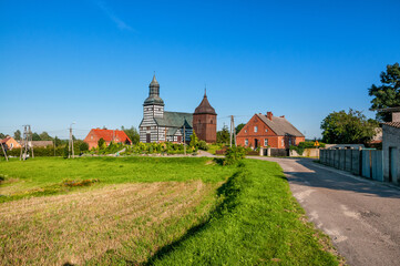 Fototapeta na wymiar Half-timbered Church of St. Trinity in Wielki Buczek, Greater Poland Voivodeship, Poland