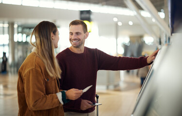 Airport, travel and couple at check in machine with passport and ticket for flight. Valentines day,...