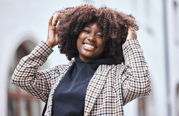 Black woman, portrait and afro hair in city fun, goofy or silly travel in urban New York or holiday location. Smile, happy or playful student in fashion, trendy or cool clothes with natural hairstyle