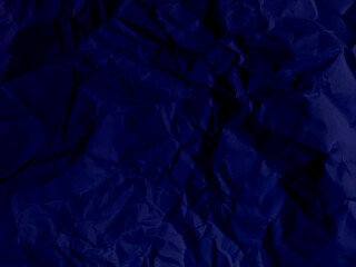 Realistic and crumpled blue paper texture or blue canvas or a blue paper surface, blue crumpled fabric stain texture with various griany stains.