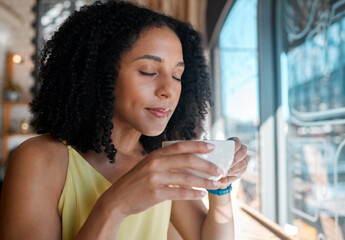 Black woman, relax or smelling coffee in cafe shop or restaurant for lunch break, mindfulness or...