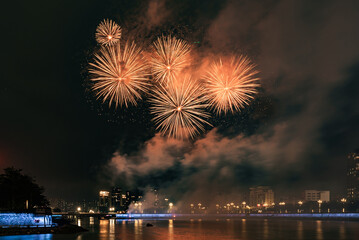 Beautiful fireworks exploded over the Dong river in DongGuang, china. Chinese New Year and Lantern Festival Festival celebration.