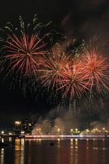 Fototapeta premium Beautiful fireworks exploded over the Dong river in DongGuang, china. Chinese New Year and Lantern Festival Festival celebration.