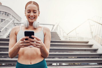 City, workout and woman with smartphone, smile for communication, typing and headphones after exercise. Health, training and runner on 5g phone, fitness app to connect or network in sports.