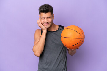 Obraz premium young caucasian woman basketball player man isolated on purple background frustrated and covering ears
