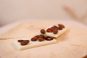 white chocolate with almond on wood 