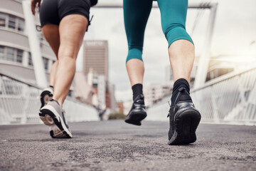 Fitness, city or legs running in training, workout or cardio exercise on New York bridge for a...