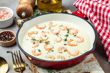 shrimps bechamel sauce in pan. pasta. Food recipe background. Close up