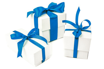 three white gift boxes with blue ribbon on white background