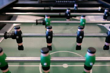 Fototapeta premium Selective focus on foosball table player
