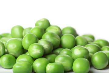 Fresh green peas on a white background