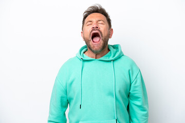 Middle age caucasian man isolated on white background shouting to the front with mouth wide open