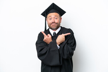 Middle age university graduate man isolated on white background pointing to the laterals having doubts