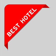Red color of corner label banner with word best hotel on gray background