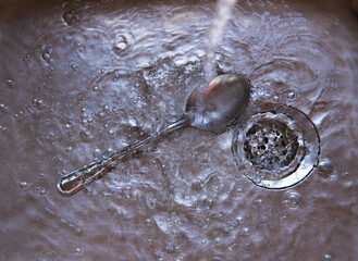 drops of water on a spoon
