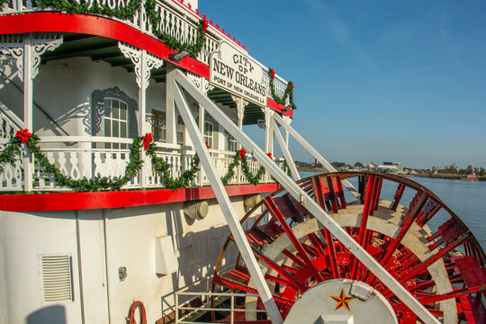 New Orleans, USA – December 3, 2022 - The SS Natchez steamboat with Christmas decorations on Mississippi River in New Orleans, Louisiana