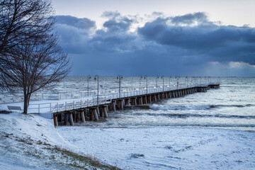 Fototapeta na wymiar Beautiful landscape of the cliff in Gdynia Orłowo in snowy winter, Baltic Sea. Poland