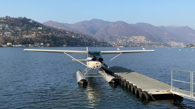 Water plane on Lake Como unforgettable nature of Italy, tourist flights by water plane