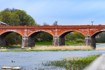 Fototapeta premium red brick bridge in Latvia