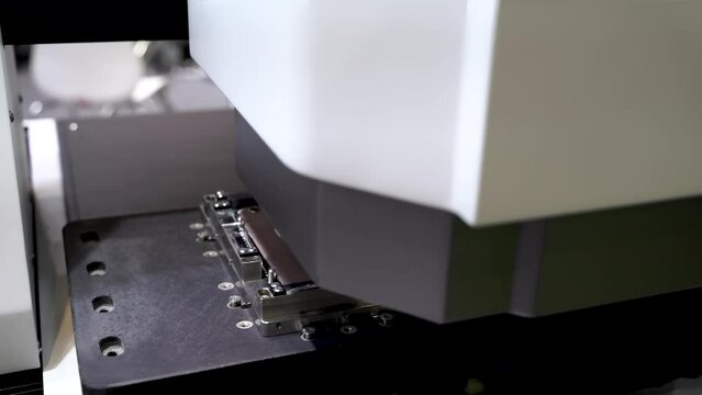 artificial intelligence machine with camera sensor working in mobile phone factory