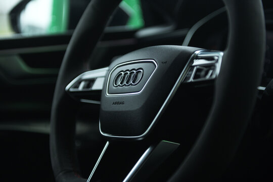 Belarus, Minsk - 24.01.2023: Interior of a premium car Audi RS 7 Sportback steering wheel and dashboard. Audi RS7 Sportback.