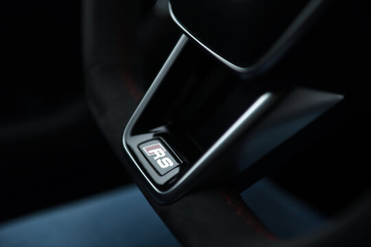 Belarus, Minsk - 24.01.2023: Interior of a premium car Audi RS 7 Sportback steering wheel and dashboard. Audi RS7 Sportback.