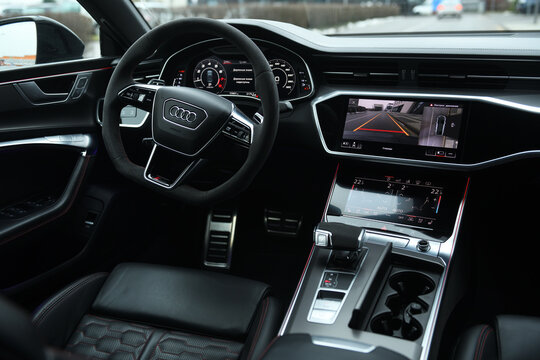 Belarus, Minsk - 24.01.2023: Interior of a premium car Audi RS 7 Sportback steering wheel and dashboard. Audi RS7 Sportback.