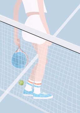Picture of female tennis player standing near net on sports ground