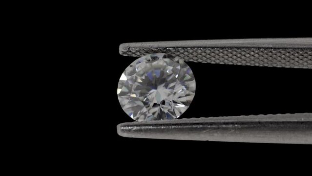 Round moissanite gemstone black backround double diffraction