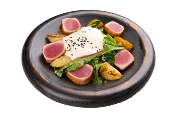 Grilled tuna, lettuce and potato wedges in a plate. Transparent.