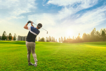 Fototapeta na wymiar Male golf player on professional golf course.