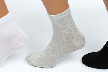 Socks on a white background. Socks on the leg.