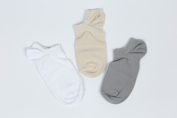 Socks on a white background. Socks on the leg.