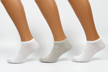 Socks on a white background. Socks on the leg.