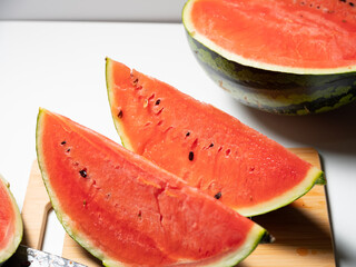 watermelon cut on cutting board