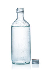 Water glass bottle close up on a white background