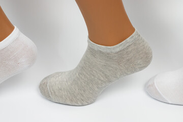 Socks on a white background. Socks on the leg.