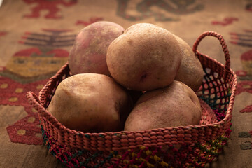 cuzco peru traditional raw potato from the peruvian andes called canchan for sale in market