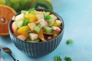 A bowl with fresh fruit salad	