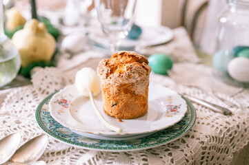 happy easter holiday in springtime season. natural homemade baked cake on plate on table. festive home decor. traditional food. sophisticated country rustic tablscape style