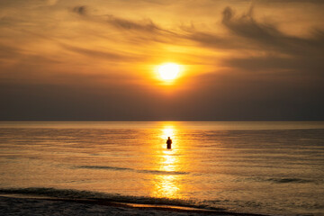 Angler im Sonnenuntergang
