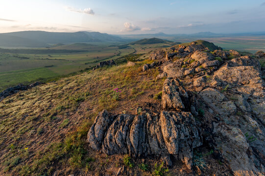romanian national park mountains munti macin above danube rocks and green meadows
